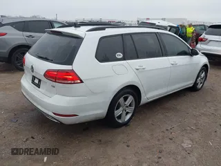 2018 Volkswagen Golf SportWagen S with VIN 3VWD17AU2JM761651, listed as a IAAI auction lot 41598726 with 125,244 mi miles. Bid and sale history available at carsss.com. Image 4.