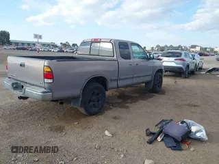 2000 Toyota Tundra SR5 with VIN 5TBRT3411YS002814, listed as a IAAI auction lot 41253815 with 155,327 mi miles and . Bid and sale history available at DreamBid. Image 4.