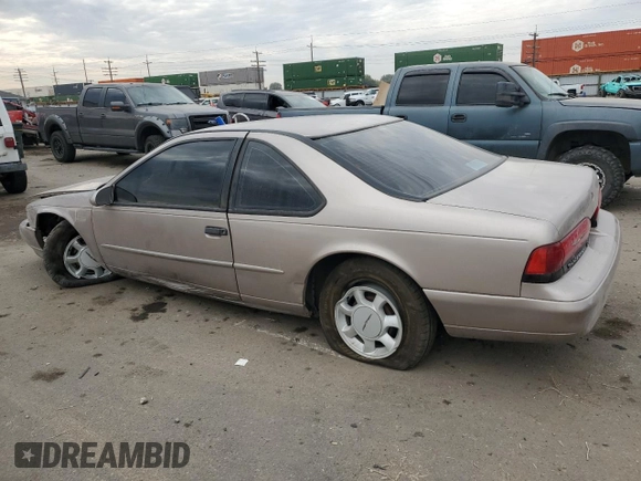 1994 Ford Thunderbird LX with VIN 1FALP6241RH110457, listed as a Copart auction lot 76384254 with 54,653 mi miles and Salvage Title. Bid and sale history available at DreamBid. Image 2.