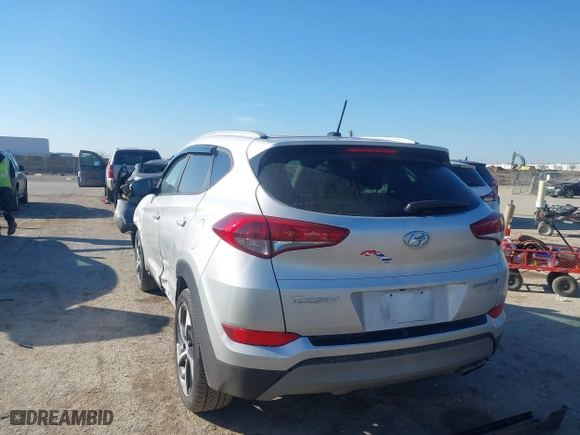 2017 Hyundai Tucson Value with VIN KM8J33A22HU457809, listed as a IAAI auction lot 41632652 with 26,154 mi miles. Bid and sale history available at carsss.com. Image 3.