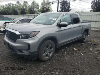 2023 Honda Ridgeline RTL with VIN 5FPYK3F58PB040248, listed as a Copart auction lot 57930785 with 66,198 mi miles and Salvage title. Bid and sale history available at DreamBid. Image 1.