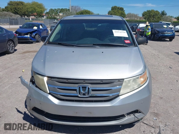 2012 Honda Odyssey Touring with VIN 5FNRL5H90CB099519, listed as a IAAI auction lot 41854550 with 185,110 mi miles. Bid and sale history available at carsss.com. Image 13.