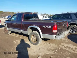2004 Dodge Dakota SLT with VIN 1D7HG42N34S571352, listed as a IAAI auction lot 41406195 with 206,694 mi miles. Bid and sale history available at carsss.com. Image 3.
