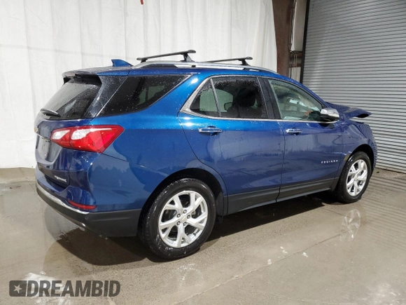 2021 Chevrolet Equinox Premier z VIN 2GNAXNEV3M6138086, wystawiony jako Copart lot #41781105 z przebiegiem 18 008 mil mil oraz Szkoda całkowita • Salvage title. Historia ofert i sprzedaży dostępna na DreamBid. Obrazek 3.
