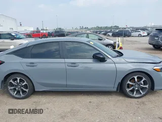 2025 Honda Civic Sport Touring z VIN 19XFL4H94SE000539, wystawiony jako IAAI lot #41777545 z przebiegiem 7 128 mil mil oraz . Historia ofert i sprzedaży dostępna na DreamBid. Obrazek 13.