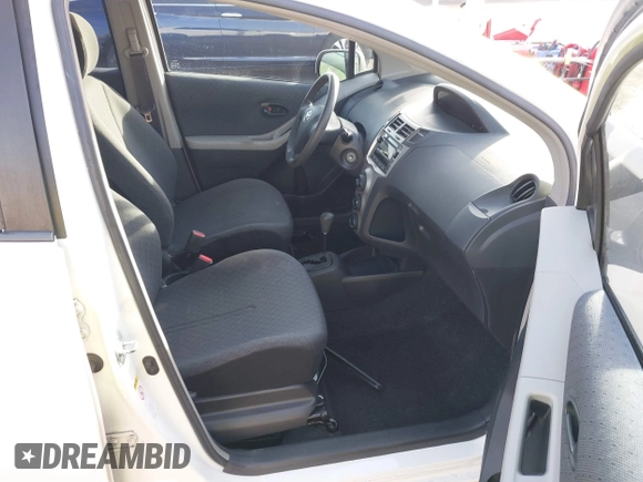 2009 Toyota Yaris with VIN JTDKT903795263620, listed as a IAAI auction lot 41100398 with 66,384 mi miles. Bid and sale history available at carsss.com. Image 5.