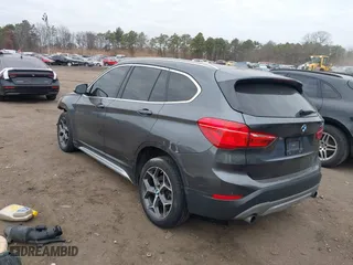 2017 BMW X1 xDrive28i with VIN WBXHT3C37H5F86637, listed as a IAAI auction lot 41300161 with 95,459 mi miles. Bid and sale history available at carsss.com. Image 3.
