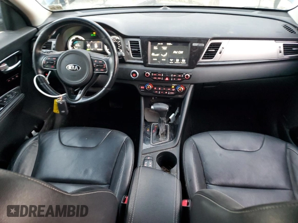 2019 Kia Niro Touring with VIN KNDCE3LC7K5321433, listed as a Copart auction lot 88004415 with 104,435 mi miles and Salvage Title. Bid and sale history available at carsss.com. Image 8.