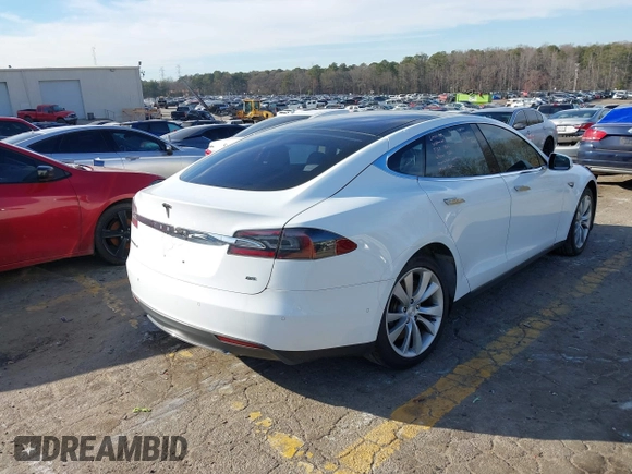 2014 Tesla Model S 60 with VIN 5YJSA1H13EFP62451, listed as a IAAI auction lot 41639068 with 88,000 mi miles and . Bid and sale history available at DreamBid. Image 4.