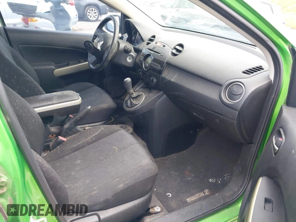 2012 Mazda 2 Sport with VIN JM1DE1KY5C0144238, listed as a IAAI auction lot 42073776 with 55,181 mi miles. Bid and sale history available at carsss.com. Image 5.