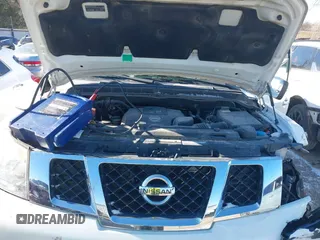 2015 Nissan Armada Platinum z VIN 5N1BA0NF7FN611136, wystawiony jako IAAI lot #41375085 z przebiegiem 130 819 mil mil oraz . Historia ofert i sprzedaży dostępna na DreamBid. Obrazek 10.