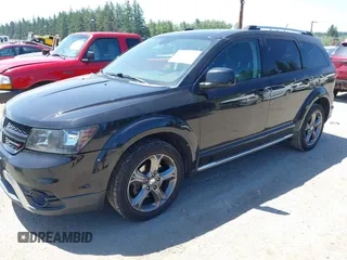 2015 Dodge Journey Crossroad z VIN 3C4PDDGGXFT607189, wystawiony jako IAAI lot #42475316 z przebiegiem 186 317 mil mil oraz . Historia ofert i sprzedaży dostępna na DreamBid. Obrazek 2.