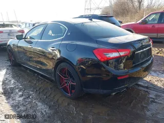 2014 Maserati Ghibli with VIN ZAM57XSA4E1090315, listed as a IAAI auction lot 41423507 with 115,323 mi miles. Bid and sale history available at carsss.com. Image 3.