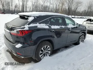 2021 Lexus RX with VIN 2T2AZMDA6MC289848, listed as a Copart auction lot 43322595 with 13,657 mi miles and Salvage Title. Bid and sale history available at carsss.com. Image 3.