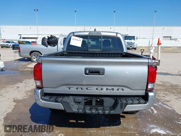 2021 Toyota Tacoma SR with VIN 3TYAX5GN0MT020061, listed as a IAAI auction lot 41592670 with 18,862 mi miles and . Bid and sale history available at DreamBid. Image 17.