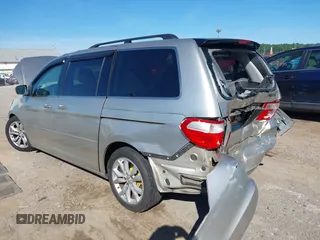 2005 Honda Odyssey EX z VIN 5FNRL38465B411189, wystawiony jako IAAI lot #42310199 z przebiegiem 304 142 mil mil oraz . Historia ofert i sprzedaży dostępna na DreamBid. Obrazek 6.