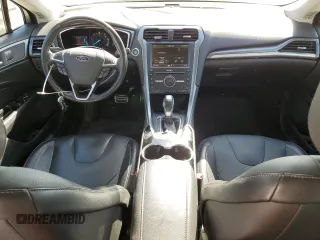 2016 Ford Fusion Titanium Hybrid with VIN 3FA6P0RU0GR153294, listed as a Copart auction lot 52723515 with 117,570 mi miles and Salvage title. Bid and sale history available at DreamBid. Image 8.