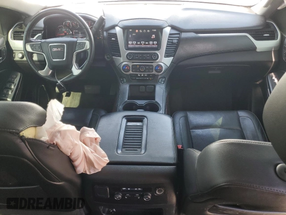 2016 GMC Yukon XL SLT with VIN 1GKS2GKC6GR228033, listed as a Copart auction lot 52450055 with 135,476 mi miles and Salvage Title. Bid and sale history available at DreamBid. Image 8.