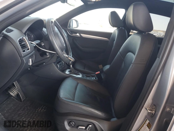 2018 Audi Q3 Premium with VIN WA1ECCFS0JR004256, listed as a Copart auction lot 56906885 with 66,581 mi miles and Salvage title. Bid and sale history available at DreamBid. Image 7.