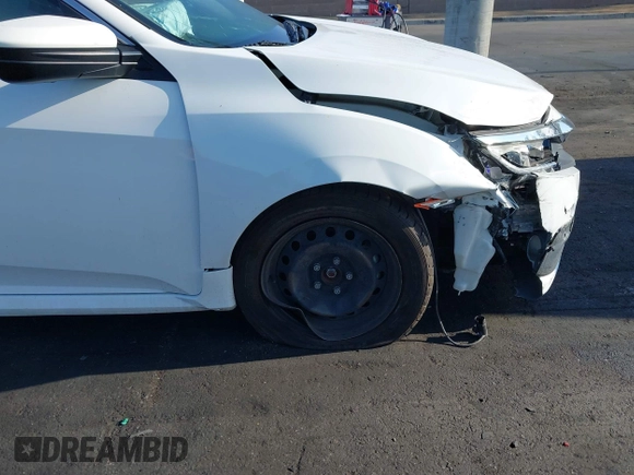2018 Honda Civic LX with VIN 2HGFC2F56JH502770, listed as a IAAI auction lot 42117291 with 60,651 mi miles and . Bid and sale history available at DreamBid. Image 12.