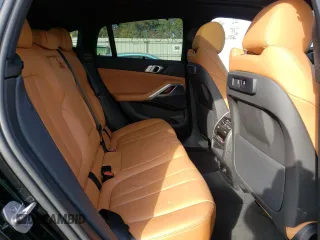 2022 BMW X6 xDrive40i z VIN 5UXCY6C08N9L22942, wystawiony jako Copart lot #64176732 z przebiegiem 21 538 mil mil oraz . Historia ofert i sprzedaży dostępna na DreamBid. Obrazek 6.