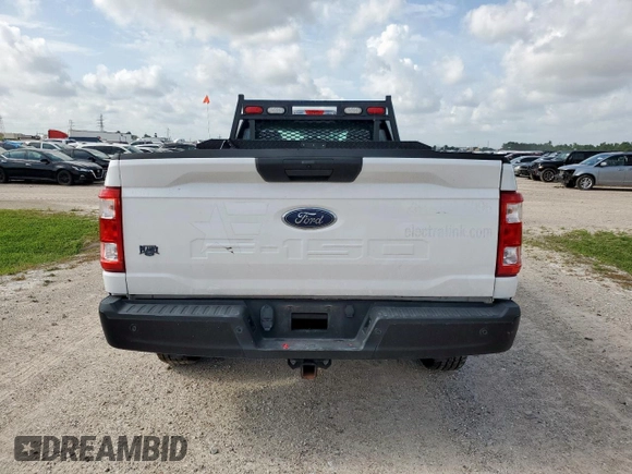 2022 Ford F-150 XL with VIN 1FTMF1C56NKD24644, listed as a Copart auction lot 63307315 with 64,704 mi miles and Salvage title. Bid and sale history available at DreamBid. Image 6.
