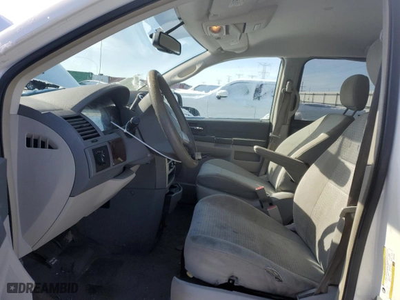 2009 Chrysler Town & Country LX with VIN 2A8HR44E19R651056, listed as a Copart auction lot 49892665 with 169,755 mi miles and Salvage Title. Bid and sale history available at carsss.com. Image 7.