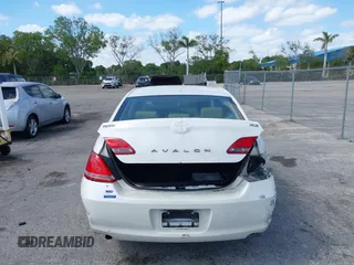 2009 Toyota Avalon XL with VIN 4T1BK36BX9U326841, listed as a IAAI auction lot 42156100 with 166,999 mi miles and . Bid and sale history available at DreamBid. Image 6.