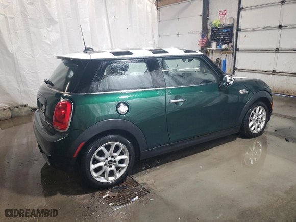 2016 MINI Cooper Hardtop S with VIN WMWXP7C52G3B49822, listed as a Copart auction lot 86055244 with 96,676 mi miles and Salvage Title. Bid and sale history available at carsss.com. Image 3.