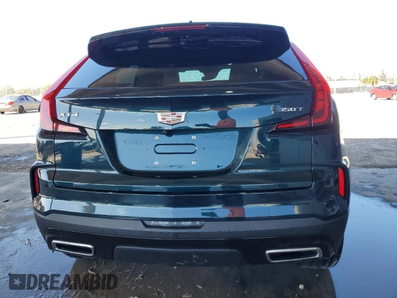 2024 Cadillac XT4 FWD Premium Luxury z VIN 1GYFZCR43RF241465, wystawiony jako Copart lot #49428795 z przebiegiem Nie podano mil oraz Szkoda całkowita • Salvage title. Historia ofert i sprzedaży dostępna na DreamBid. Obrazek 6.