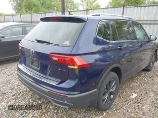 2022 Volkswagen Tiguan SE with VIN 3VV2B7AX8NM098143, listed as a IAAI auction lot 42209345 with 32,891 mi miles and . Bid and sale history available at DreamBid. Image 4.