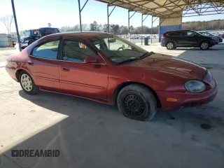 1999 Mercury Sable GS z VIN 1MEFM50U5XA637869, wystawiony jako Copart lot #41387635 z przebiegiem 108 562 mil mil oraz Szkody całkowita. Historia ofert i sprzedaży dostępna na DreamBid. Obrazek 4.