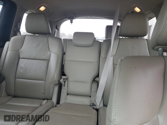 2012 Honda Odyssey Touring with VIN 5FNRL5H9XCB078399, listed as a Copart auction lot 52360165 with 174,819 mi miles and Salvage Title. Bid and sale history available at DreamBid. Image 10.