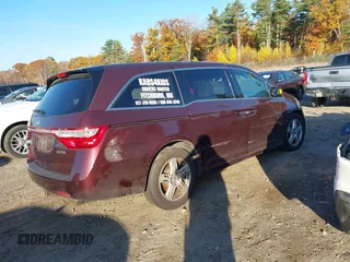 2012 Honda Odyssey Touring z VIN 5FNRL5H9XCB067841, wystawiony jako IAAI lot #40631672 z przebiegiem 210 237 mil mil oraz . Historia ofert i sprzedaży dostępna na DreamBid. Obrazek 4.