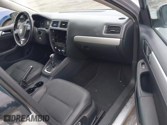 2012 Volkswagen Jetta TDI w/Premium & Nav with VIN 3VWLL7AJ8CM364248, listed as a IAAI auction lot 42292490 with 268,674 mi miles and . Bid and sale history available at DreamBid. Image 5.
