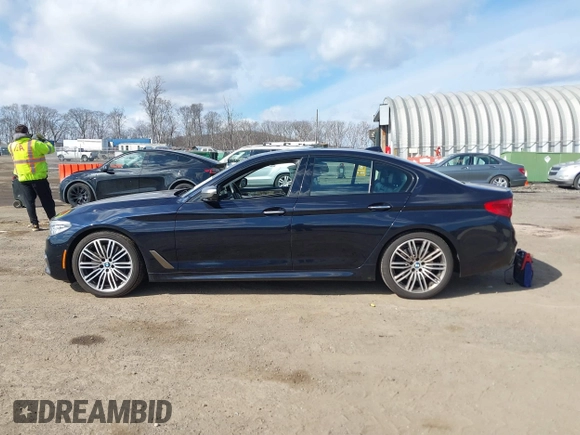2018 BMW 5 Series M550i xDrive with VIN WBAJB9C52JB035930, listed as a IAAI auction lot 41674415 with 56,294 mi miles and . Bid and sale history available at DreamBid. Image 14.