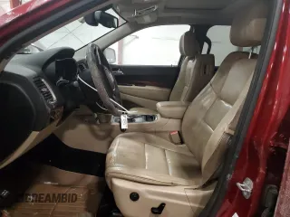 2014 Dodge Durango Limited z VIN 1C4RDJDG1EC978196, wystawiony jako Copart lot #88952065 z przebiegiem 187 341 mil mil oraz Szkody całkowita. Historia ofert i sprzedaży dostępna na DreamBid. Obrazek 7.