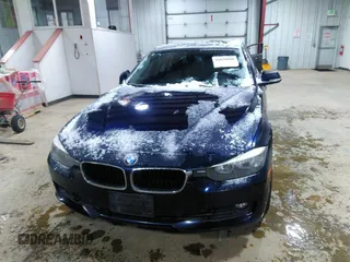 2014 BMW 3 Series 328i xDrive with VIN WBA3B3C57EF545372, listed as a IAAI auction lot 42078980 with 116,627 mi miles and . Bid and sale history available at carsss.com. Image 12.