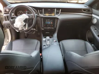 2023 Infiniti QX55 Essential with VIN 3PCAJ5KR2PF101501, listed as a Copart auction lot 57913585 with 13,999 mi miles and Salvage title. Bid and sale history available at DreamBid. Image 8.