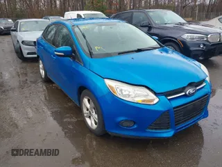 2014 Ford Focus SE with VIN 1FADP3F28EL193582, listed as a IAAI auction lot 41866782 with 166,733 mi miles. Bid and sale history available at carsss.com. Image 1.