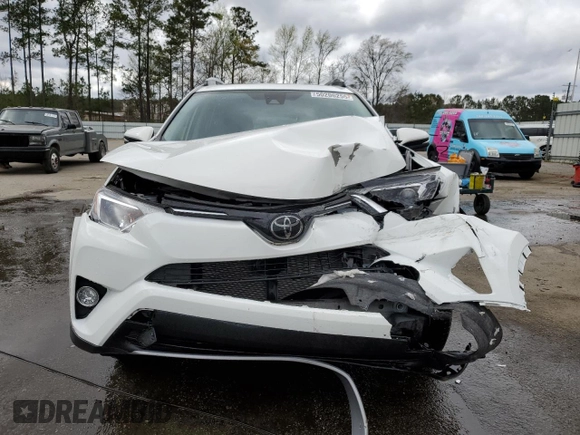 2018 Toyota RAV4 XLE with VIN JTMWFREV3JJ737450, listed as a Copart auction lot 50206255 with 7,805 mi miles and Salvage Title. Bid and sale history available at DreamBid. Image 5.