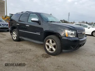 2012 Chevrolet Tahoe LTZ with VIN 1GNSKCE02CR173734, listed as a Copart auction lot 50291805 with 223,962 mi miles and Salvage title. Bid and sale history available at DreamBid. Image 4.