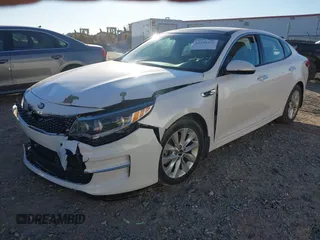 2016 Kia Optima EX with VIN 5XXGU4L36GG008399, listed as a IAAI auction lot 41239371 with 115,150 mi miles. Bid and sale history available at carsss.com. Image 2.