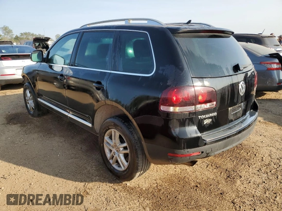 2010 Volkswagen Touareg VR6 with VIN WVGBF7A9XAD001790, listed as a Copart auction lot 70806534 with 90,103 mi miles and Salvage Title. Bid and sale history available at DreamBid. Image 2.