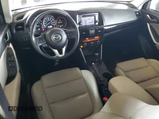 2014 Mazda CX-5 Grand Touring with VIN JM3KE2DY5E0383597, listed as a Copart auction lot 50205545 with 110,052 mi miles and Salvage Title. Bid and sale history available at carsss.com. Image 8.