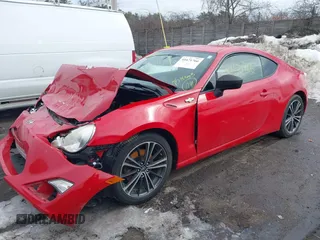 2013 Scion FR-S with VIN JF1ZNAA14D2710394, listed as a IAAI auction lot 41671766 with 53,405 mi miles. Bid and sale history available at carsss.com. Image 14.