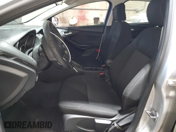 2017 Ford Focus SE with VIN 1FADP3F29HL223970, listed as a Copart auction lot 66022345 with 104,601 mi miles and Clean title. Bid and sale history available at DreamBid. Image 7.