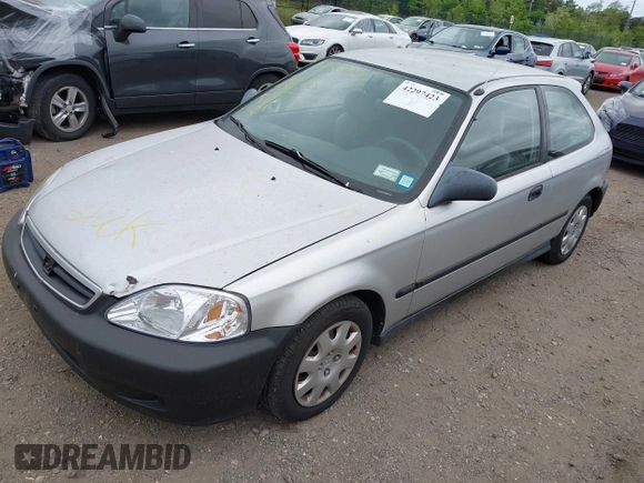 2000 Honda Civic DX z VIN 2HGEJ6441YH111880, wystawiony jako IAAI lot #42297423 z przebiegiem 163 631 mil mil oraz . Historia ofert i sprzedaży dostępna na DreamBid. Obrazek 2.