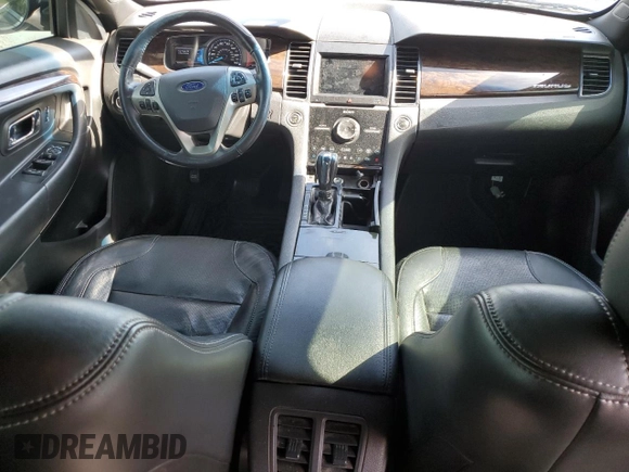 2015 Ford Taurus Limited с VIN 1FAHP2F86FG127106, выставлен на аукционе Copart как лот 61724995 с пробегом 90 343 миль миль и Чистый • Clean title. История ставок и продаж доступна на DreamBid. Изображение 8.