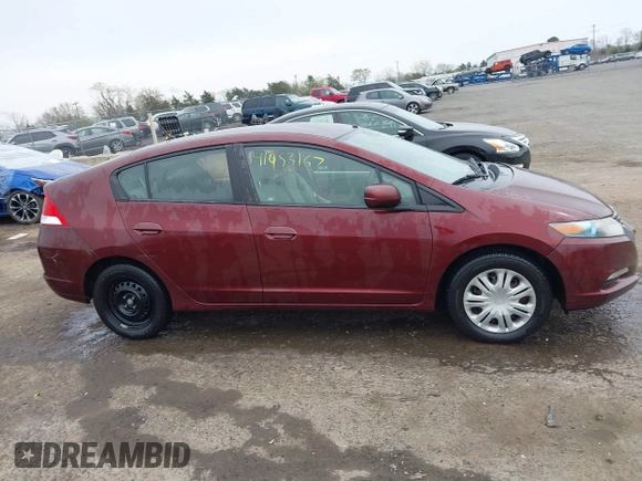 2011 Honda Insight with VIN JHMZE2H37BS011148, listed as a IAAI auction lot 41953167 with 79,143 mi miles and . Bid and sale history available at DreamBid. Image 13.